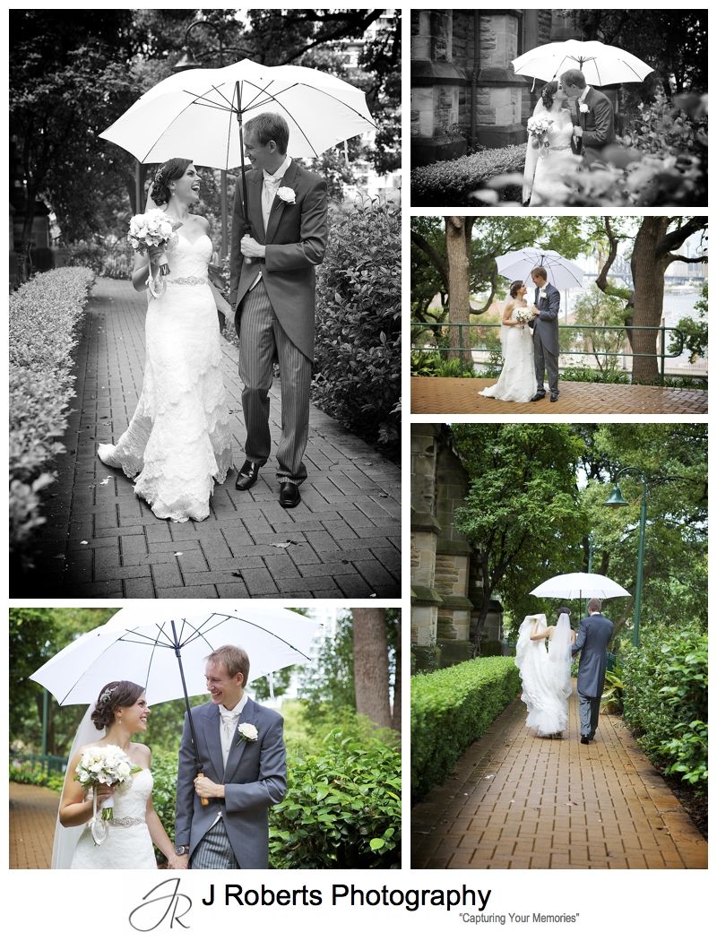 Gorgeous couple with white umbrella in the rain after wedding ceremony - sydney wedding photography 
